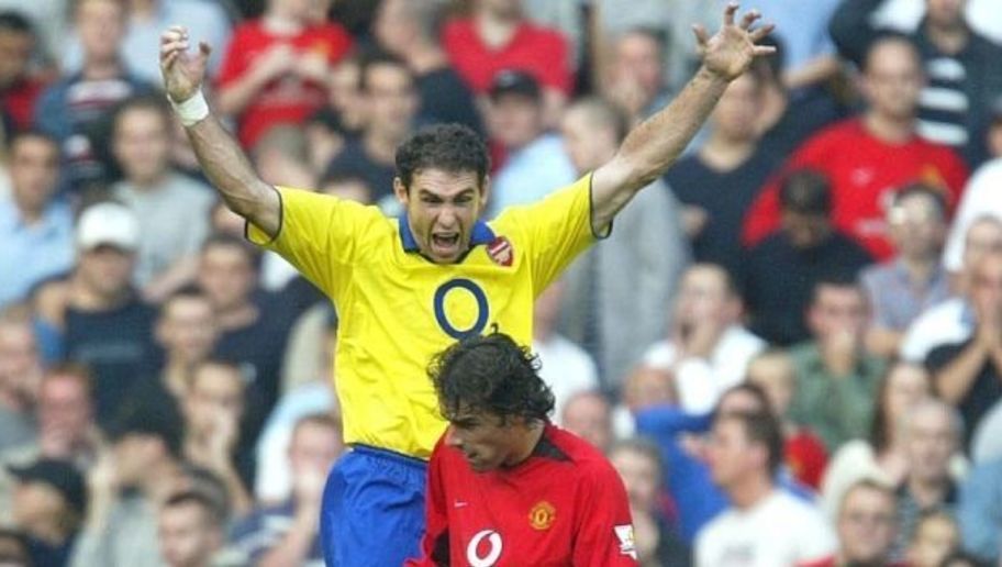 Мартин Кьолн тържествува след пропуснатата дузпа от Нистелрой в края на знаменития сблъсък между Юнайтед - Арсенал през 2003г. на Олд Трафорд