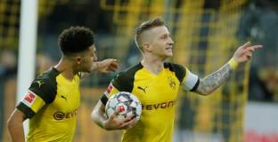 Дортмунд мина през Фрайбург и продължава да гони голямата си цел