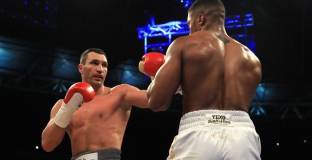 Фен може да лежи в затвора, заради гледане на боя Джошуа - Кличко 